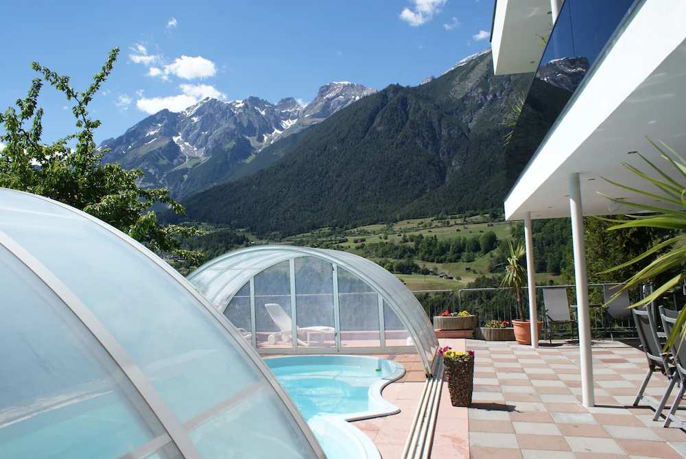 Holiday house inmidst of ski areas with pool, sauna, solarium & tiled stove